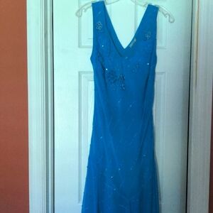 Beautiful formal dress. Perfect condition except for tag cut out.